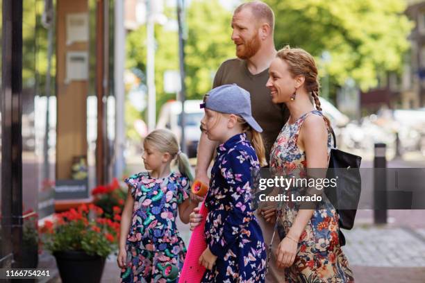 beautiful dutch farmer family in the city - family netherlands stock pictures, royalty-free photos & images