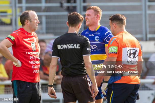 August 3: Jack Hughes of Warrington Wolves is treated on the field by medical staff after injuring a testicle, it was later revealed he carried on...