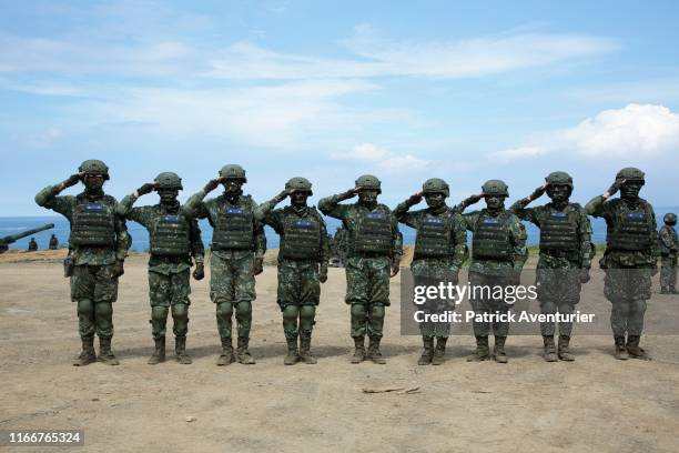 Taiwan womens artillery during a anti-invasion drill on beach on May 30, 2019 in Pingtung, Taiwan.The live firing was part of annual exercices...