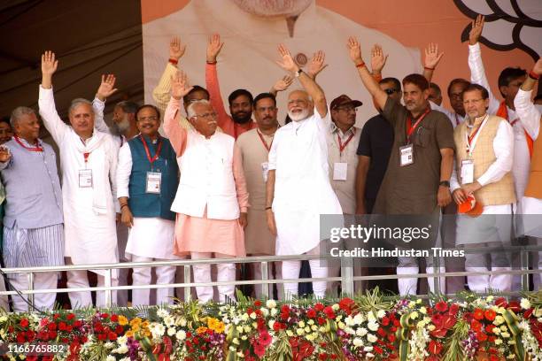 Prime Minister Narendra Modi, Haryana Chief Minister Manohar Lal Khattar, Member of Parliament Birender Singh, Haryana Finance Minister Capt....