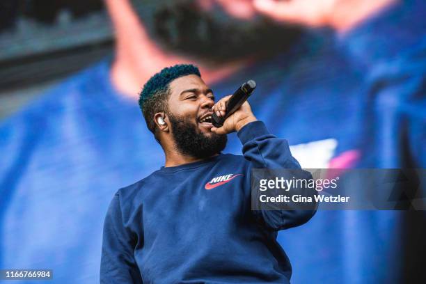 American singer Khalid performs live on stage during the second day of the Lollapalooza Berlin music festival at Olympiagelände on September 8, 2019...