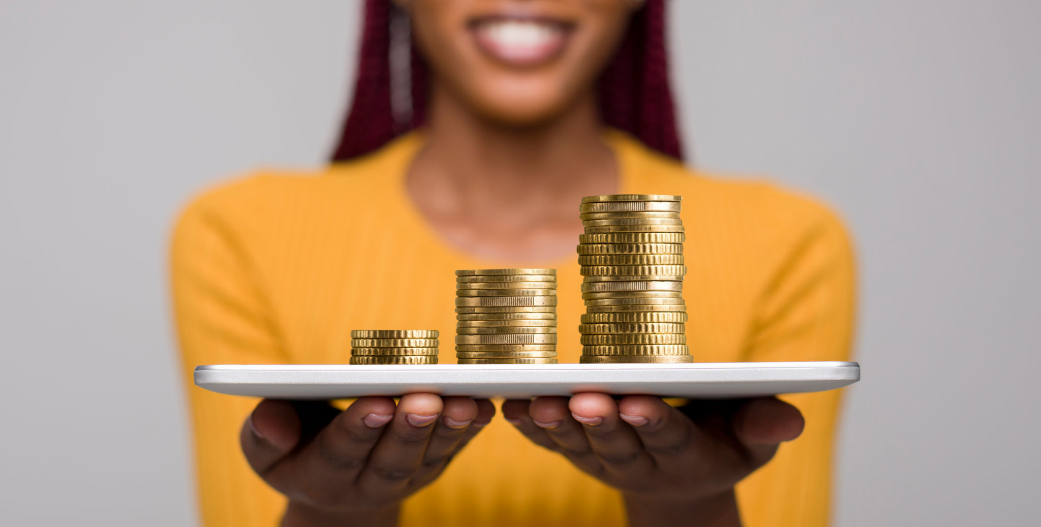 Woman with tablet proposing to earn money in the Internrt Woman with tablet proposing to earn money in the Internrt