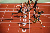 Athlets sprinting at finish line