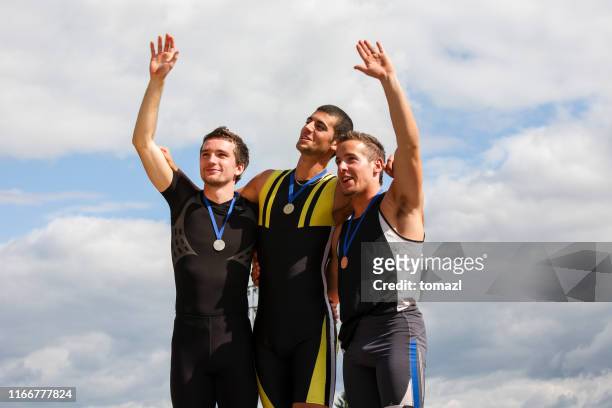 medalists of the competition - sportsperson medal stock pictures, royalty-free photos & images