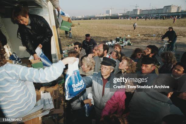 Food is provided to visitors from East Berlin, who have crossed to the west following the fall of the Berlin Wall, 12th November 1989.