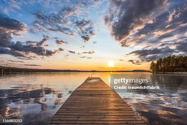 scandinavian lake at sunset - finland summer stock pictures, royalty-free photos & images