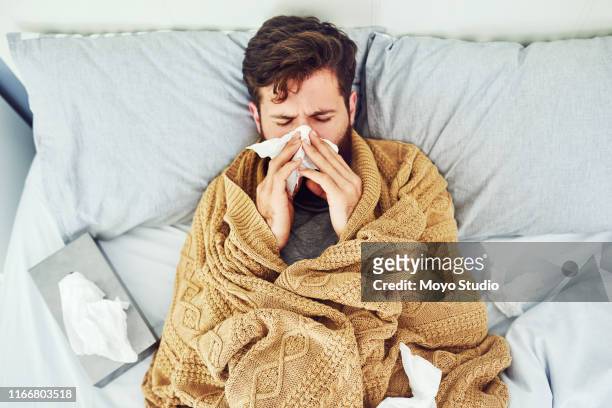 having influenza is the worst! - blowing nose stock pictures, royalty-free photos & images