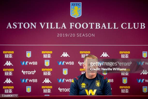 Dean Smith head coach of Aston Villa talks to the press during a press conference at the Aston Villa Bodymoor Heath training ground on August 08,...