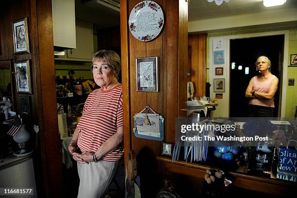 Hillwood Square residents, Tabitha Yothers and Patricia Hickerson stand in the kitchen of Yothers home on June 08, 2011 in Falls Church, VA. The...