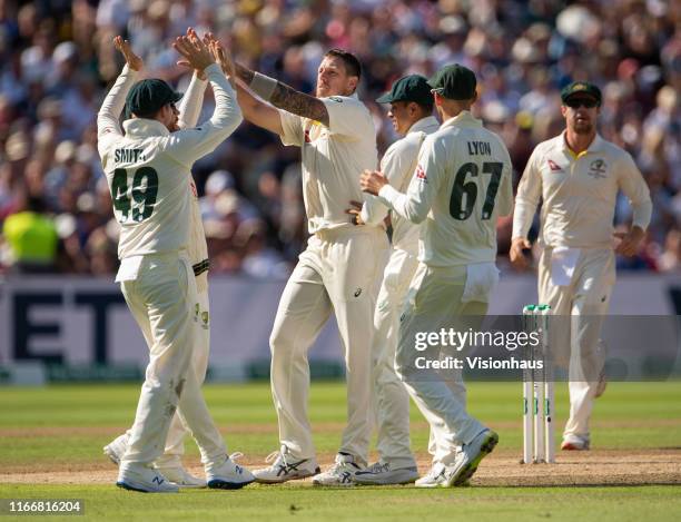 James Pattinson of Australia celebrates with team mates after taking a wicket during day two of the first Ashes test match at Edgbaston on August 2,...