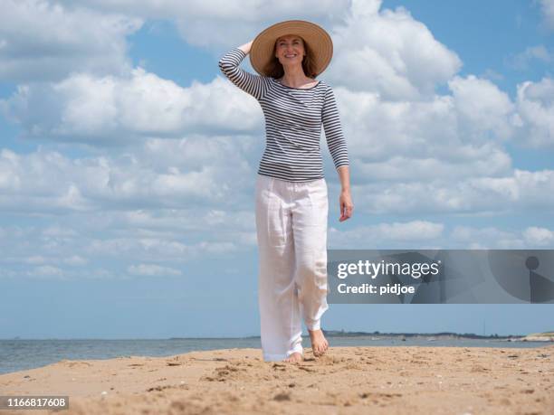 summer by the sea, starting your vacation - beach dress stock pictures, royalty-free photos & images