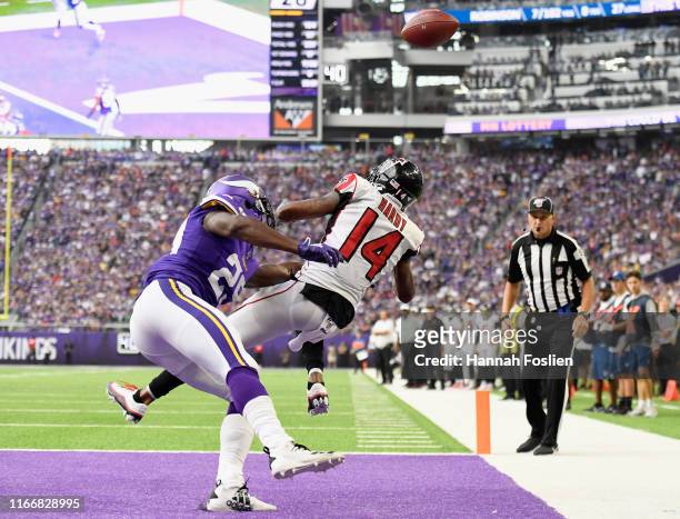 Xavier Rhodes of the Minnesota Vikings breaks up a touchdown pass intended for Justin Hardy of the Atlanta Falcons during the fourth quarter of the...
