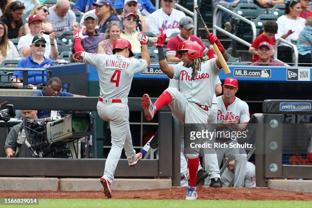 Scott Kingery of the Philadelphia Phillies celebrates his two-run home run against the New York Mets with Maikel Franco during the seventh inning of...