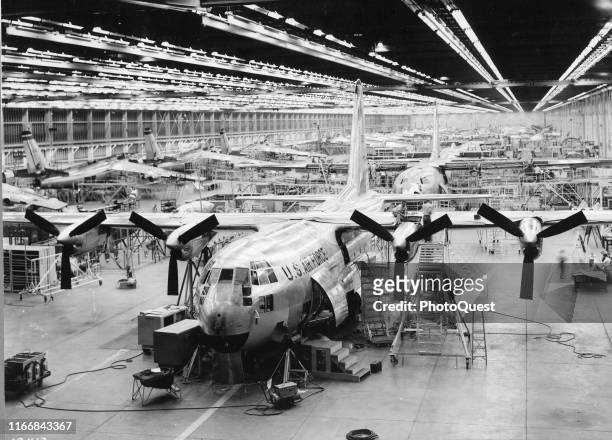 Elevated view of the first production version of the US Air Force's Lockheed C-130A Hercules military transports at Lockheed's factory, Marietta,...