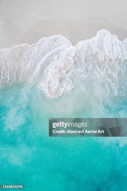 abstract wave patterns washing ashore seen from above, barbados - sand fotografías e imágenes de stock