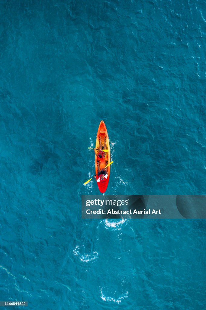 Single kayak in the ocean, Barbados