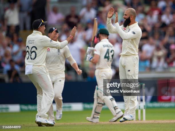 Moeen Ali of England celebrates taking the wicket of Cameron Bancroft of Australia during day three of the First Ashes test match at Edgbaston on...
