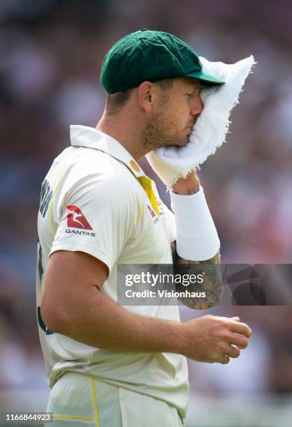 James Pattinson of Australia wipes his face during day three of the First Ashes test match at Edgbaston on August 3, 2019 in Birmingham, England.