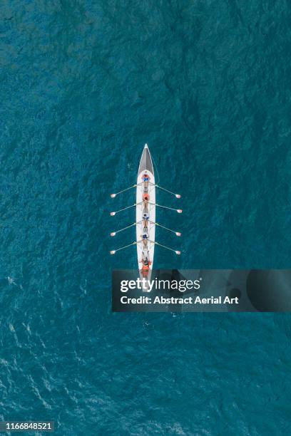 rowboat on the ocean as seen from above, france - accord concepts - fotografias e filmes do acervo