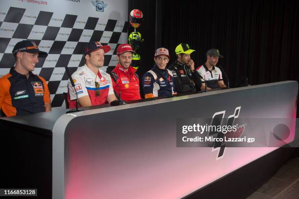 Pol Espargaro of Spain and Red Bull KTM Factory Racing, Jack Miller of Australia and Pramac Racing, Andrea Dovizioso of Italy and Ducati Team, Marc...