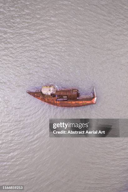 drone shot above a sunken vessel, brittany, france - sunken stockfoto's en -beelden