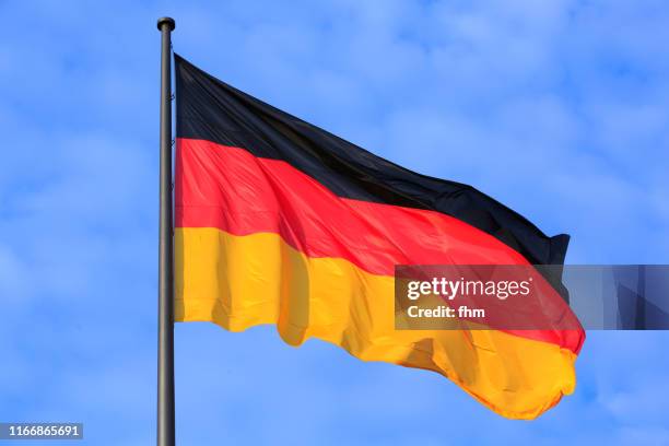 german flag (berlin, germany) - deutschland flagge stock-fotos und bilder