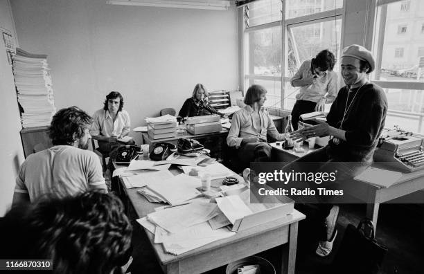 Writers Ian MacNaughton, Terry Jones, unknown, Graham Chapman, Michael Palin and Neil Innes in a script conference for BBC television show 'Monty...