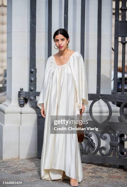 Bettina Looney is seen wearing creme white dress outside Designers Remix during Copenhagen Fashion Week Spring/Summer 2020 on August 08, 2019 in...