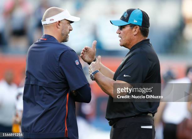 Chicago Bears head coach Matt Nagy speaks with Carolina Panthers head coach Ron Rivera prior to a preseason game at Soldier Field on August 08, 2019...
