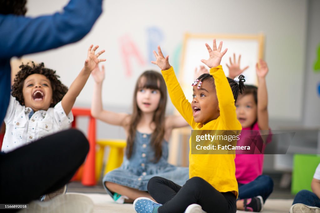 Multi-ethnic group of preschool students in class