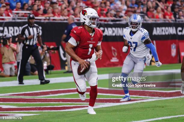 Arizona Cardinals quarterback Kyler Murray scrambles while being chased by Detroit Lions cornerback Justin Coleman during the NFL football game...