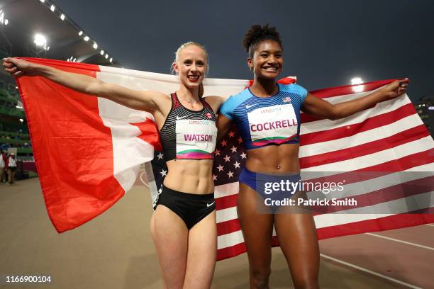 Sage Watson of Canada and Anna Cockrell of United States pose for pictures after competing in Women’s 400m Hurdles Final on Day 13 of Lima 2019 Pan...