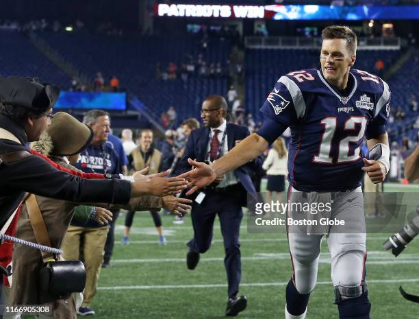 New England Patriots quarterback Tom Brady is pictured as he heads off the field following New England's 33-3 victory. The New England Patriots host...