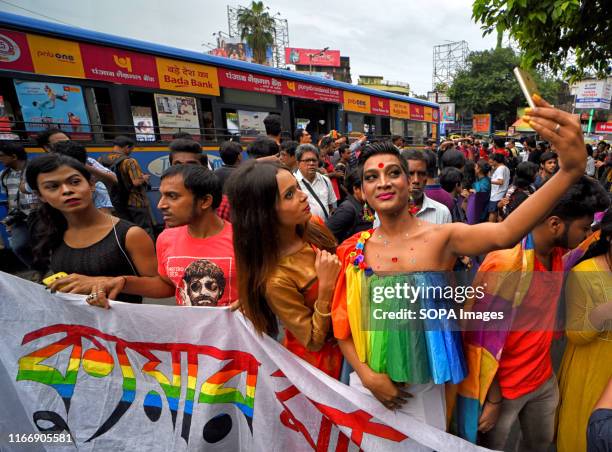 Members of Lesbian, Gay, Bisexual and Transgender Community take a Selfie before the Queer Rally. The historic verdict on partial decriminalization...