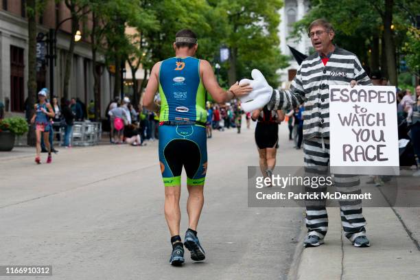 An athlete competes during the run portion of the IRONMAN Wisconsin on September 8, 2019 in Madison, Wisconsin. The IRONMAN Wisconsin triathlon...