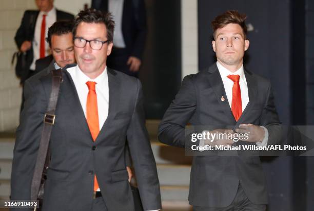 Wayne Campbell, Football Manager of the Giants and Toby Greene of the Giants arrive before Greene's AFL tribunal hearing at AFL House on September...