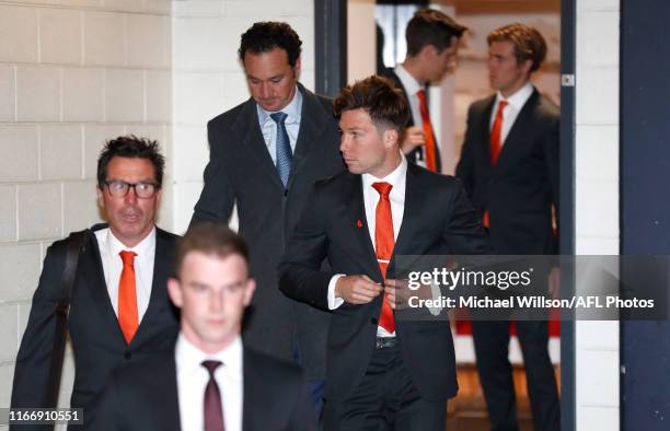 Wayne Campbell, Football Manager of the Giants , Toby Greene of the Giants and Adrian Anderson arrive before Greene's AFL tribunal hearing at AFL...