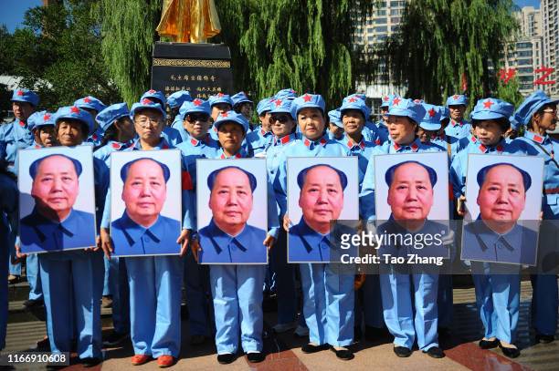 People pay respect to mark the 43th anniversary of former leader Mao Zedong's death on September 9, 2019 in Harbin, China. Chairman Mao, was a...