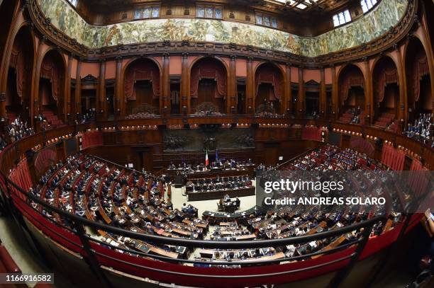 General view shows Italy's Prime Minister Giuseppe Conte delivering a speech at the Italian Chamber of Deputies on September 9, 2019 during the new...