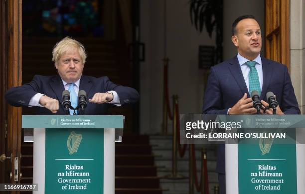 Irish Prime Minister Leo Varadkar and Britain's Prime Minister Boris Johnson give a joint press conference on the steps of the Government buildings...