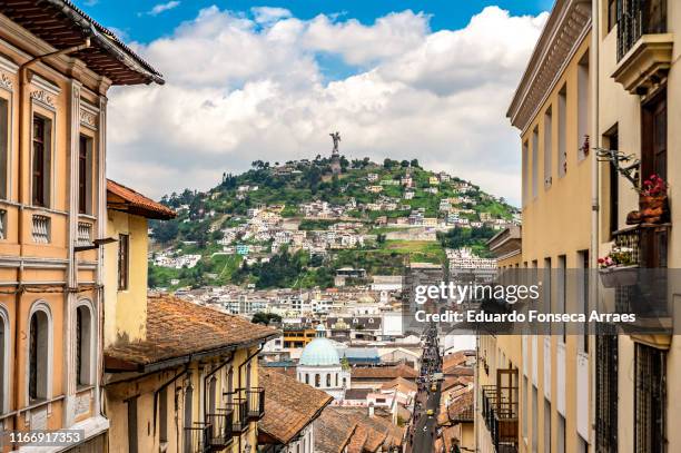 historical colonial district of quito and the monument of "virgin of el panecillo" - ecuador stock-fotos und bilder