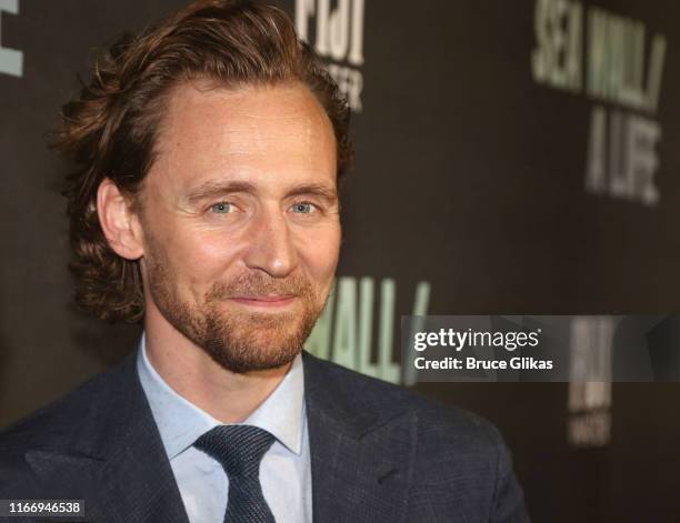 Tom Hiddleston poses at the opening night of "Sea Wall/A Life" on Broadway at The Hudson Theatre on August 8, 2019 in New York City.