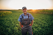 Portrait of happy senior farmer