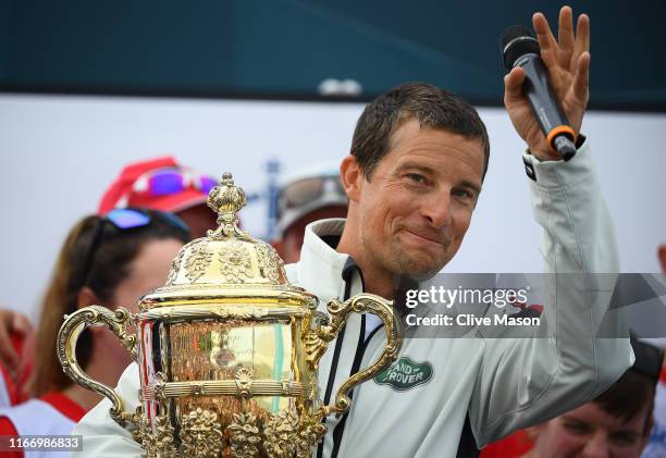 Bear Grylls and his crew competing on behalf of Tusk are presented with the Kings Cup after winning the inaugural King’s Cup regatta hosted by the...