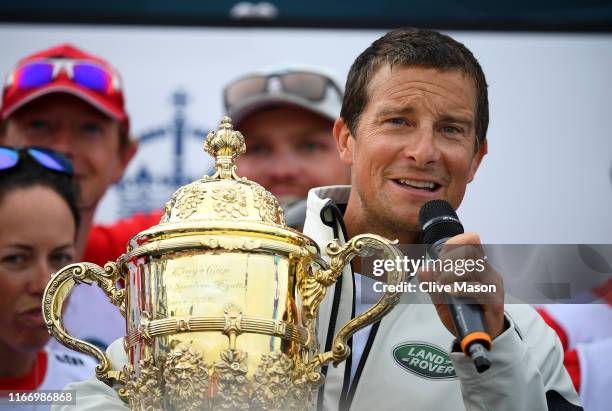 Bear Grylls and his crew competing on behalf of Tusk are presented with the Kings Cup after winning the inaugural King’s Cup regatta hosted by the...