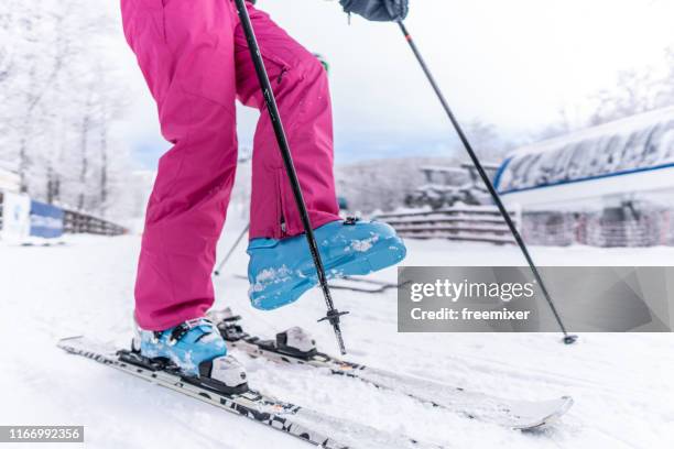 skies on my legs - ski boot stock pictures, royalty-free photos & images