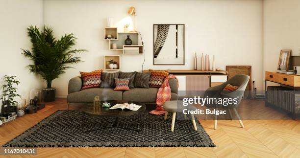 gemütliches zuhause interior - wohnzimmer frontal stock-fotos und bilder