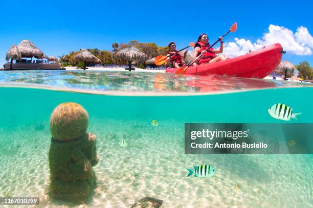 kayaking over mayan ruins - roatan stock pictures, royalty-free photos & images