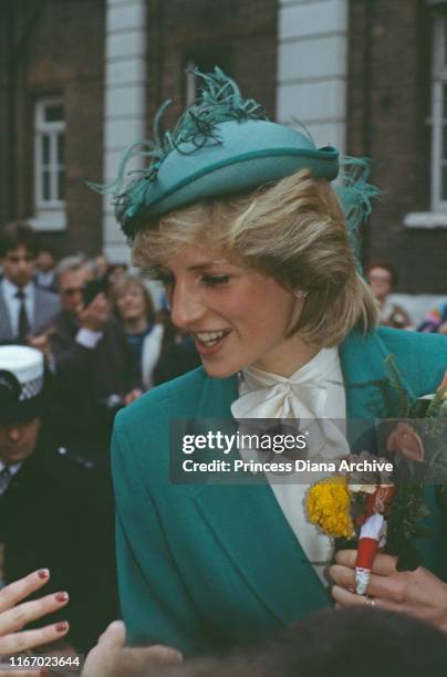 Diana, Princess of Wales wearing a green jacket and hat during a visit to Bethnal Green in London, November 1983.