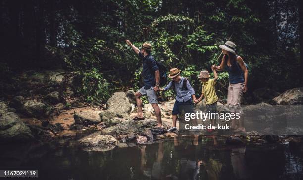 happy family at vacation - tourist mother father child thailand stock pictures, royalty-free photos & images